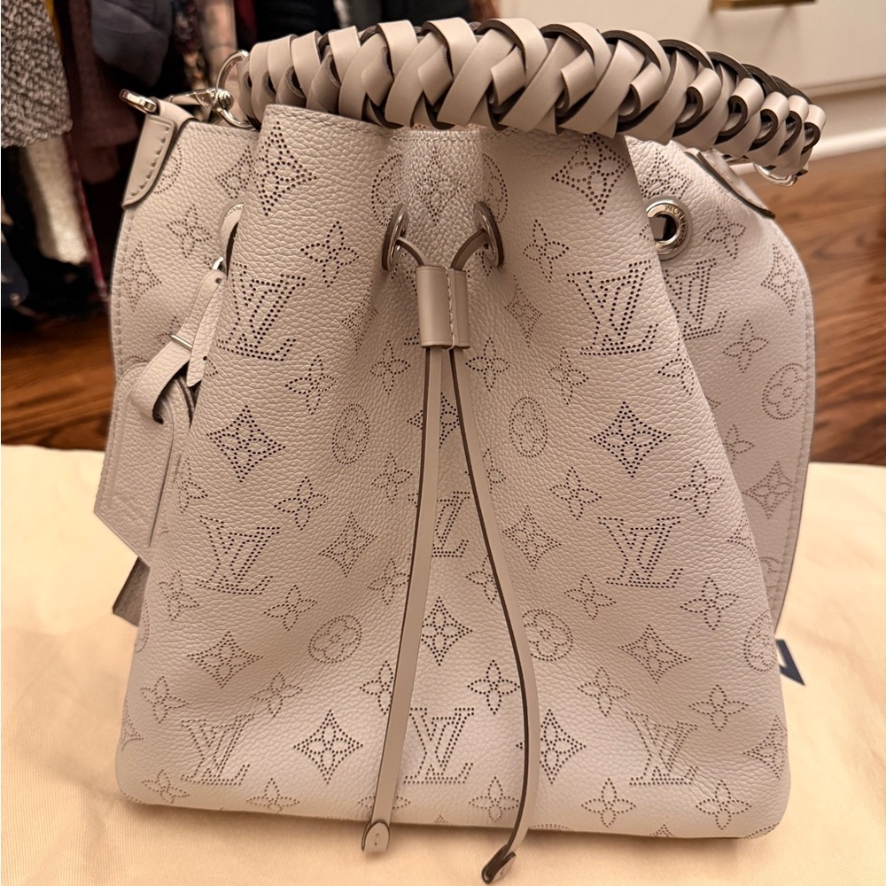 Louis Vuitton Cream Perforated Mahina Monogram Braided-Handle Bucket Bag